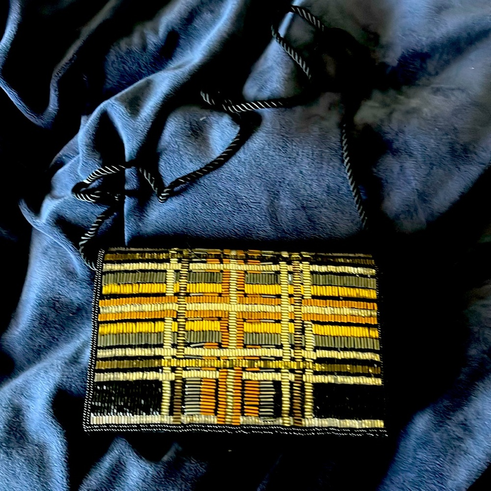 Neiman Marcus Black and sequence evening bag. Back black satin. Gold hardware